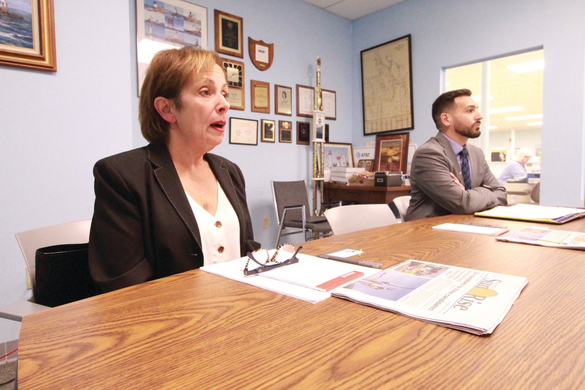 SUN RISE FORUM: Johnston mayoral candidates Karen E. Cappelli Chadwick, at left, and Joseph M. Polisena Jr., at right, squared off in a forum in the Johnston Sun Rise newsroom on Nov. 1. Candidate Brenda Lynn Leone did not attend the forum.